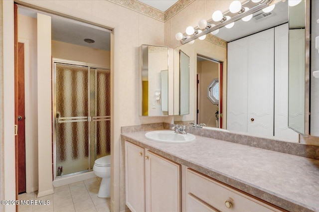 455B Portsmouth Dr, Lakewood, NJ 08701 - full bath featuring vanity, a stall shower, tile patterned flooring, toilet, and visible vents