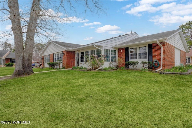 455B Portsmouth Dr, Lakewood, NJ 08701 - ranch-style home featuring a front yard and brick siding