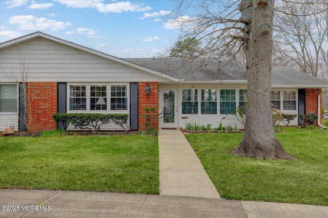 455B Portsmouth Dr, Lakewood, NJ 08701 - ranch-style house featuring a front yard and brick siding