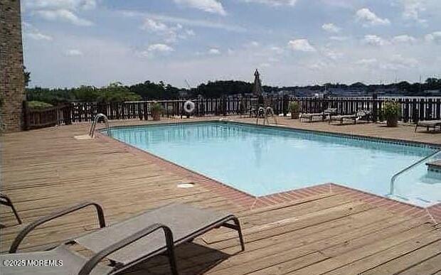 community pool with fence