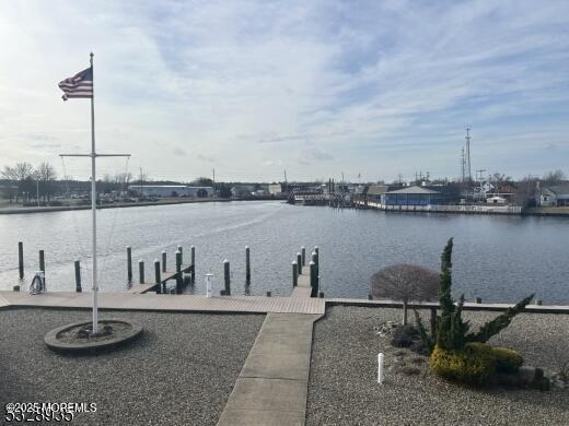 view of dock with a water view