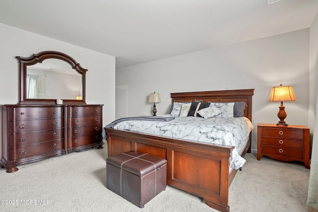 bedroom with light carpet