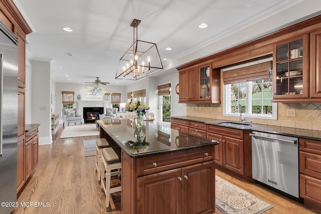 15 Monmouth Ave, Rumson, NJ 07760 - kitchen with stainless steel appliances, a sink, recessed lighting, a kitchen breakfast bar, and a ceiling fan