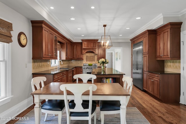 15 Monmouth Ave, Rumson, NJ 07760 - kitchen with high end appliances, dark countertops, a kitchen island, recessed lighting, and dark wood-style flooring