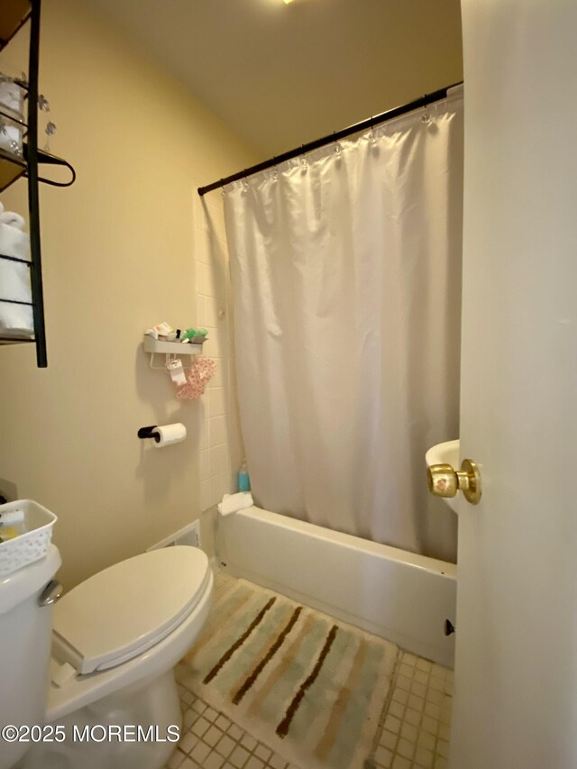439 Mantoloking Rd, Brick, NJ 08723 - bathroom featuring shower / tub combo, toilet, and tile patterned flooring