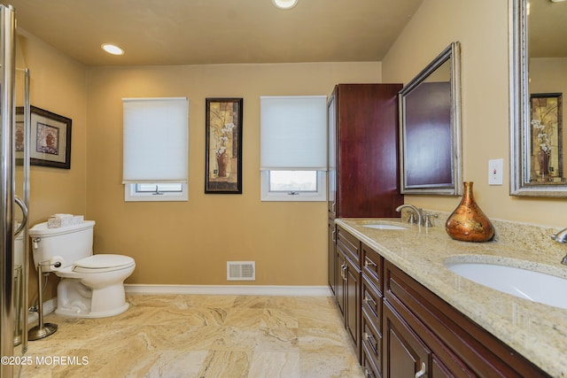 415 Spotswood Englishtown Rd, Monroe, NJ 08831 - bathroom featuring visible vents, toilet, baseboards, and a sink