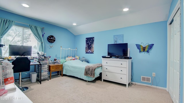 carpeted bedroom with a closet, visible vents, recessed lighting, lofted ceiling, and baseboards