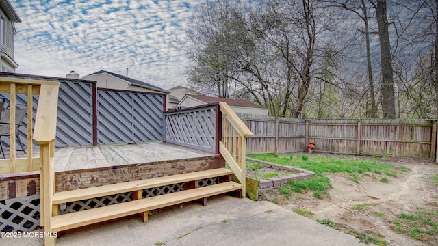 wooden deck featuring fence