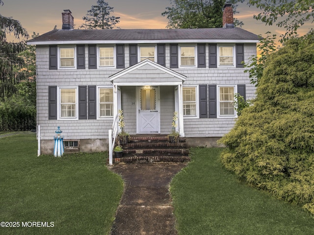 14 S Holmdel Rd, Holmdel, NJ 07733 - colonial inspired home with a chimney and a front lawn