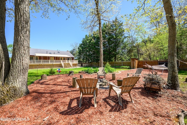 3297 Ridgeway Rd, Manchester, NJ 08759 - view of yard with a wooden deck, stairs, and a fenced backyard