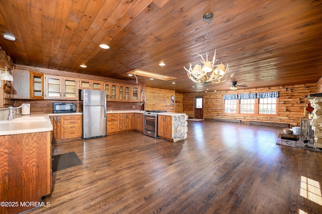 3297 Ridgeway Rd, Manchester, NJ 08759 - kitchen with wood ceiling, a sink, a peninsula, dark wood-style floors, and stainless steel appliances