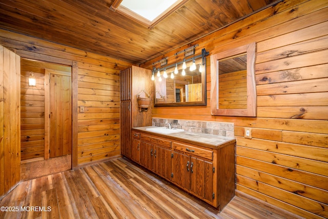3297 Ridgeway Rd, Manchester, NJ 08759 - bathroom featuring wood walls, wooden ceiling, wood finished floors, and vanity