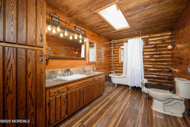 3297 Ridgeway Rd, Manchester, NJ 08759 - bathroom featuring wood-type flooring, toilet, wooden ceiling, and vanity