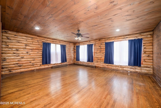 3297 Ridgeway Rd, Manchester, NJ 08759 - spare room featuring rustic walls, ceiling fan, wood finished floors, and wooden ceiling