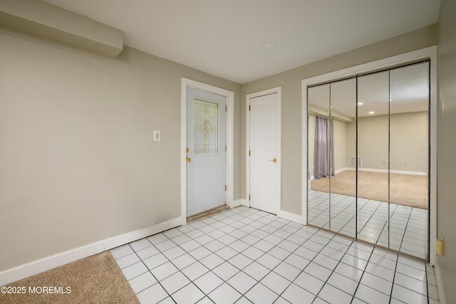 3297 Ridgeway Rd, Manchester, NJ 08759 - unfurnished bedroom with a closet, light tile patterned flooring, baseboards, recessed lighting, and light colored carpet