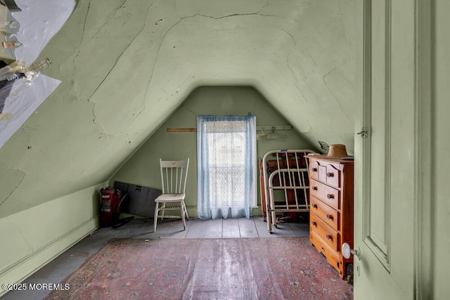 bonus room with vaulted ceiling