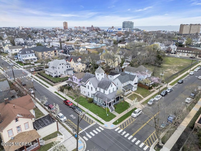 birds eye view of property with a city view