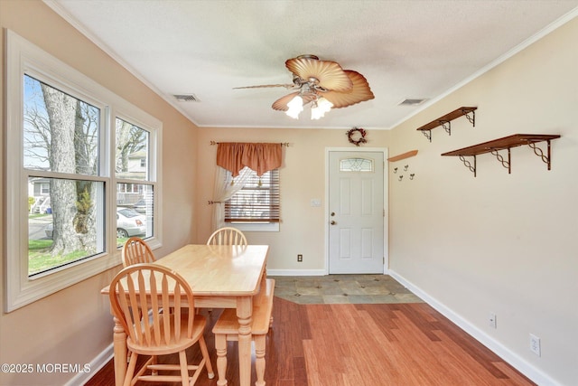 274 Prospect Ave, Old Bridge, NJ 08857 - dining space with light wood finished floors, crown molding, and ceiling fan