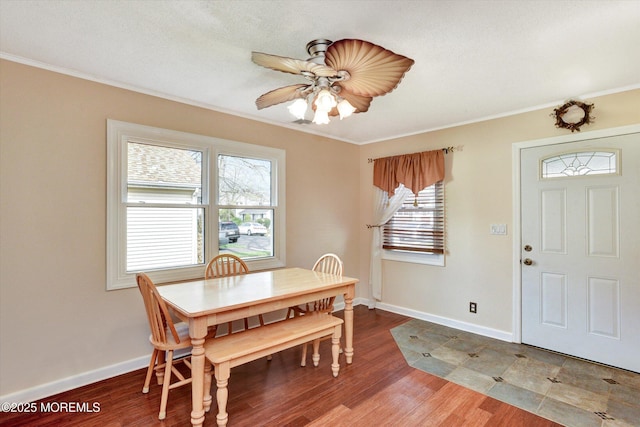 274 Prospect Ave, Old Bridge, NJ 08857 - dining area featuring ornamental molding, plenty of natural light, ceiling fan, and light wood-style flooring