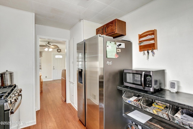 274 Prospect Ave, Old Bridge, NJ 08857 - kitchen featuring stainless steel appliances, light wood-style flooring, and ceiling fan