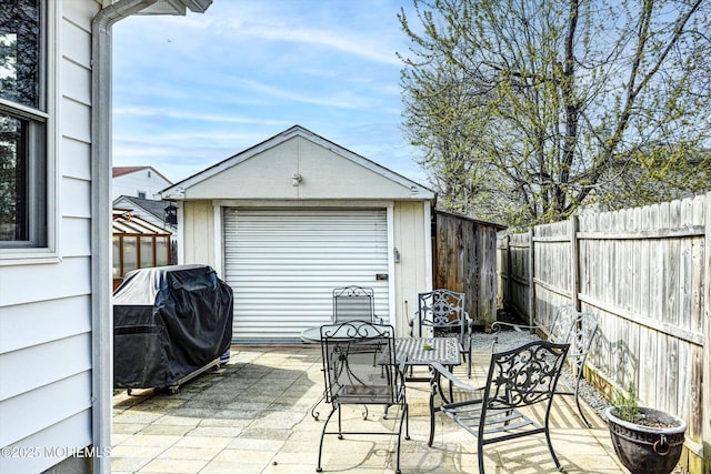 274 Prospect Ave, Old Bridge, NJ 08857 - fenced backyard with outdoor dining space, a patio area, area for grilling, and an outdoor structure