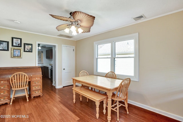 274 Prospect Ave, Old Bridge, NJ 08857 - dining space with a ceiling fan, crown molding, and wood finished floors