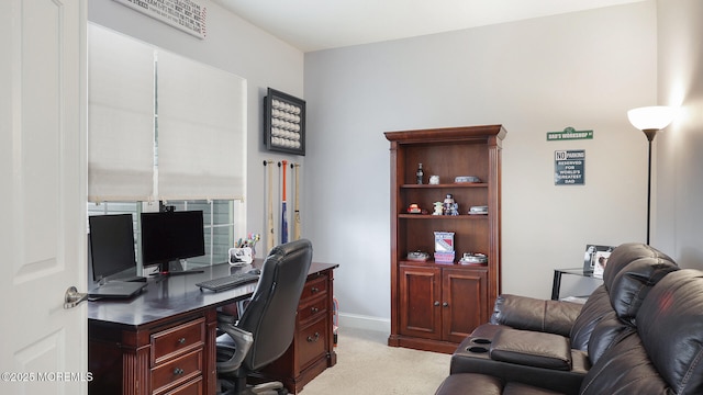 office with baseboards and carpet flooring