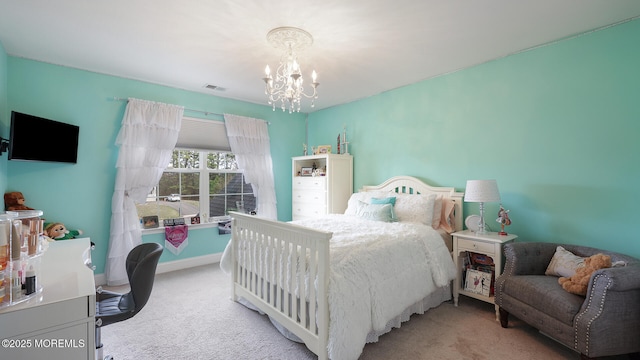carpeted bedroom with visible vents and an inviting chandelier