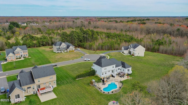 aerial view with a wooded view