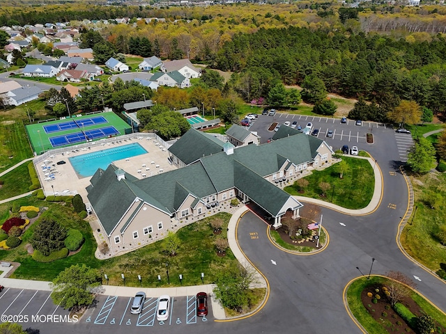 drone / aerial view with a view of trees