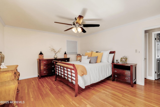 bedroom with light wood-type flooring, a ceiling fan, baseboards, and ornamental molding