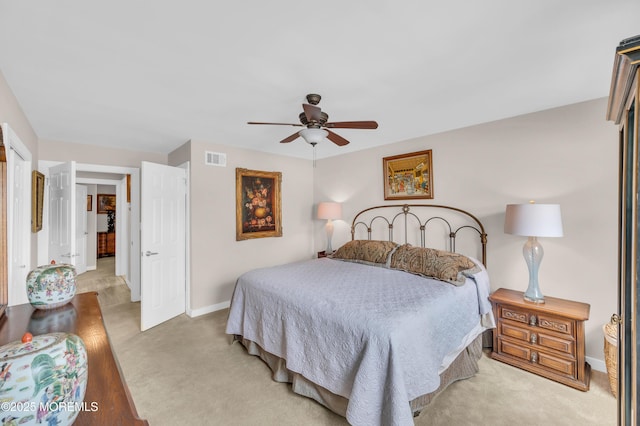 83 Parkway Dr Unit E, Freehold, NJ 07728 - bedroom featuring baseboards, light carpet, a ceiling fan, and visible vents