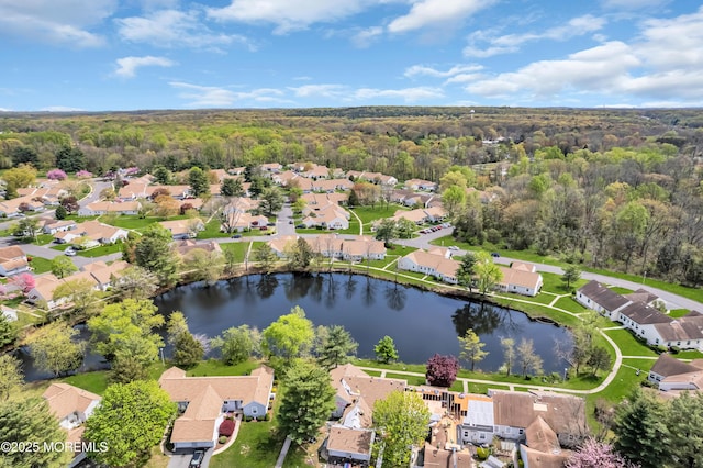 83 Parkway Dr Unit E, Freehold, NJ 07728 - bird's eye view featuring a water view, a residential view, and a wooded view