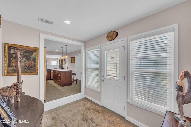 83 Parkway Dr Unit E, Freehold, NJ 07728 - entryway featuring baseboards, recessed lighting, and visible vents