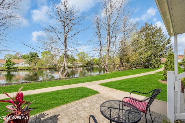 83 Parkway Dr Unit E, Freehold, NJ 07728 - view of patio / terrace with a water view
