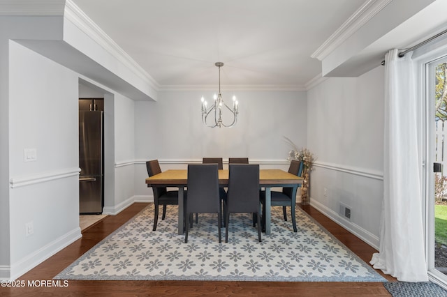 21 Spring Ct, Tinton Falls, NJ 07724 - dining area with a chandelier, ornamental molding, baseboards, visible vents, and dark wood-style floors