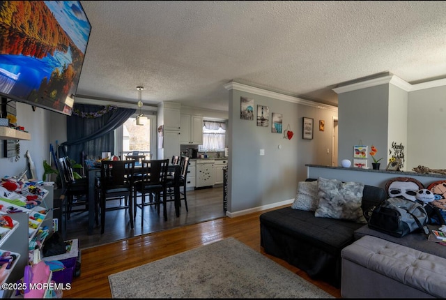 3124 Stanley Dr, Toms River, NJ 08753 - living room with crown molding, a textured ceiling, wood finished floors, and baseboards