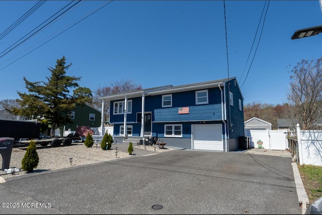 3124 Stanley Dr, Toms River, NJ 08753 - raised ranch with asphalt driveway and a garage