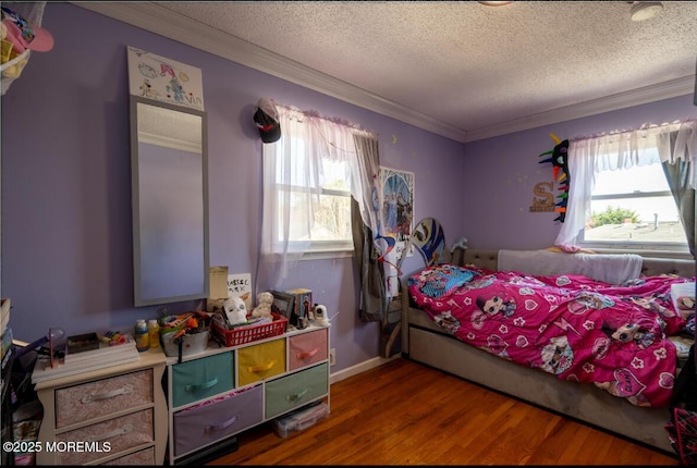 3124 Stanley Dr, Toms River, NJ 08753 - bedroom with ornamental molding, a textured ceiling, wood finished floors, and baseboards
