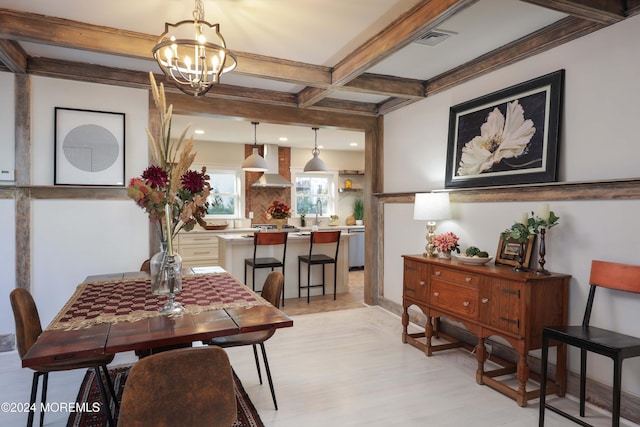 dining space featuring visible vents, recessed lighting, light wood-style floors, a notable chandelier, and beamed ceiling