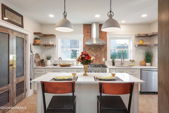 kitchen with open shelves, wall chimney exhaust hood, dishwasher, and white cabinetry