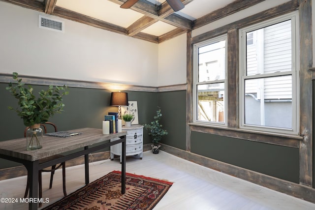 office area featuring coffered ceiling, wood finished floors, visible vents, beamed ceiling, and baseboards
