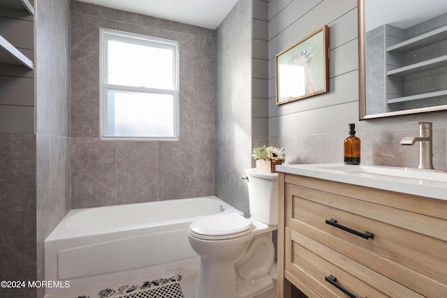 full bathroom with toilet, vanity, and tile walls