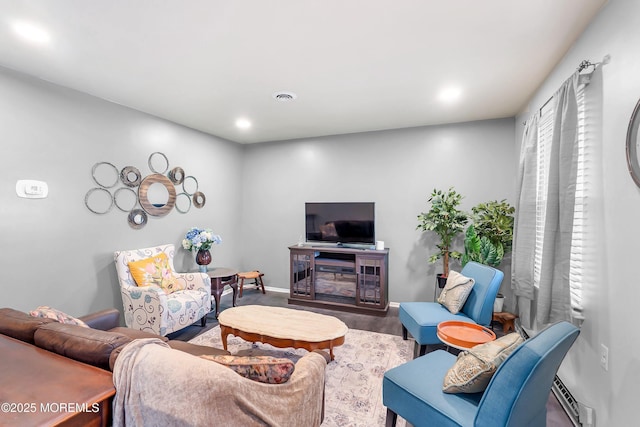 1 Adams Ct, Whiting, NJ 08759 - living area with baseboards, baseboard heating, recessed lighting, and wood finished floors