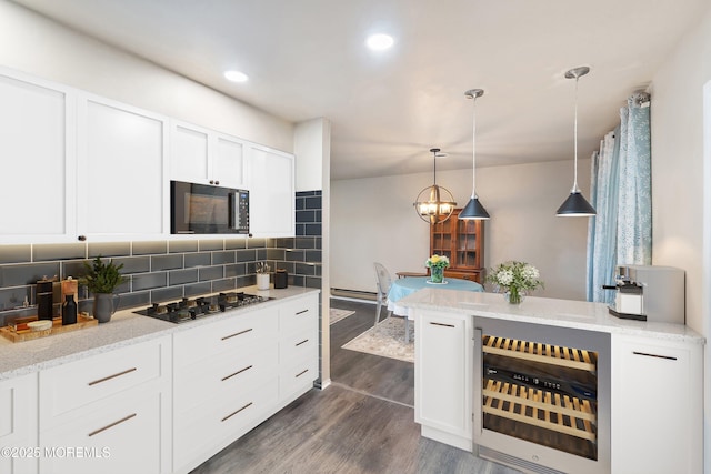 1 Adams Ct, Whiting, NJ 08759 - kitchen with stainless steel gas cooktop, dark wood-style flooring, white cabinetry, backsplash, and beverage cooler