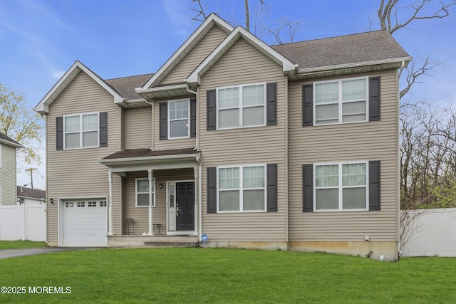89 Orchard St, Freehold, NJ 07728 - view of front of house with a garage, driveway, fence, and a front lawn