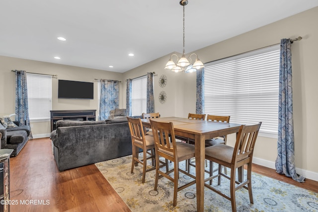 89 Orchard St, Freehold, NJ 07728 - dining area with wood finished floors, a notable chandelier, baseboards, and recessed lighting