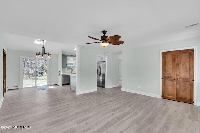 unfurnished living room featuring visible vents, a baseboard heating unit, baseboards, light wood-style flooring, and ceiling fan with notable chandelier
