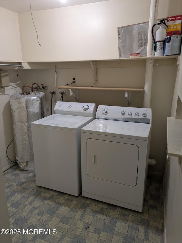 laundry room featuring independent washer and dryer and laundry area
