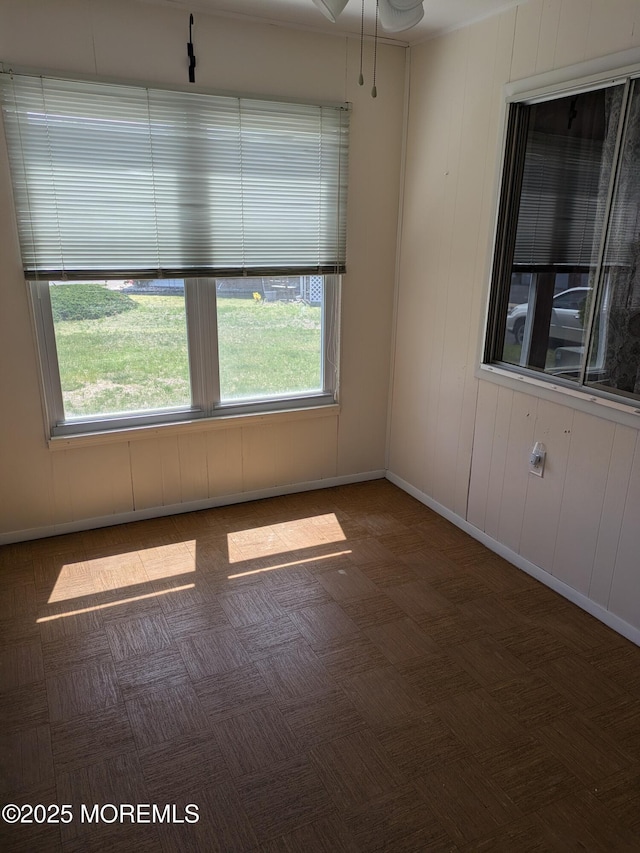 empty room with baseboards